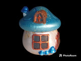 Blue mushroom house jar